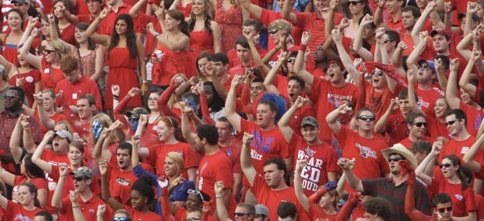 So many Louisiana Tech fans all dressed in red colored clothes cheering for their team